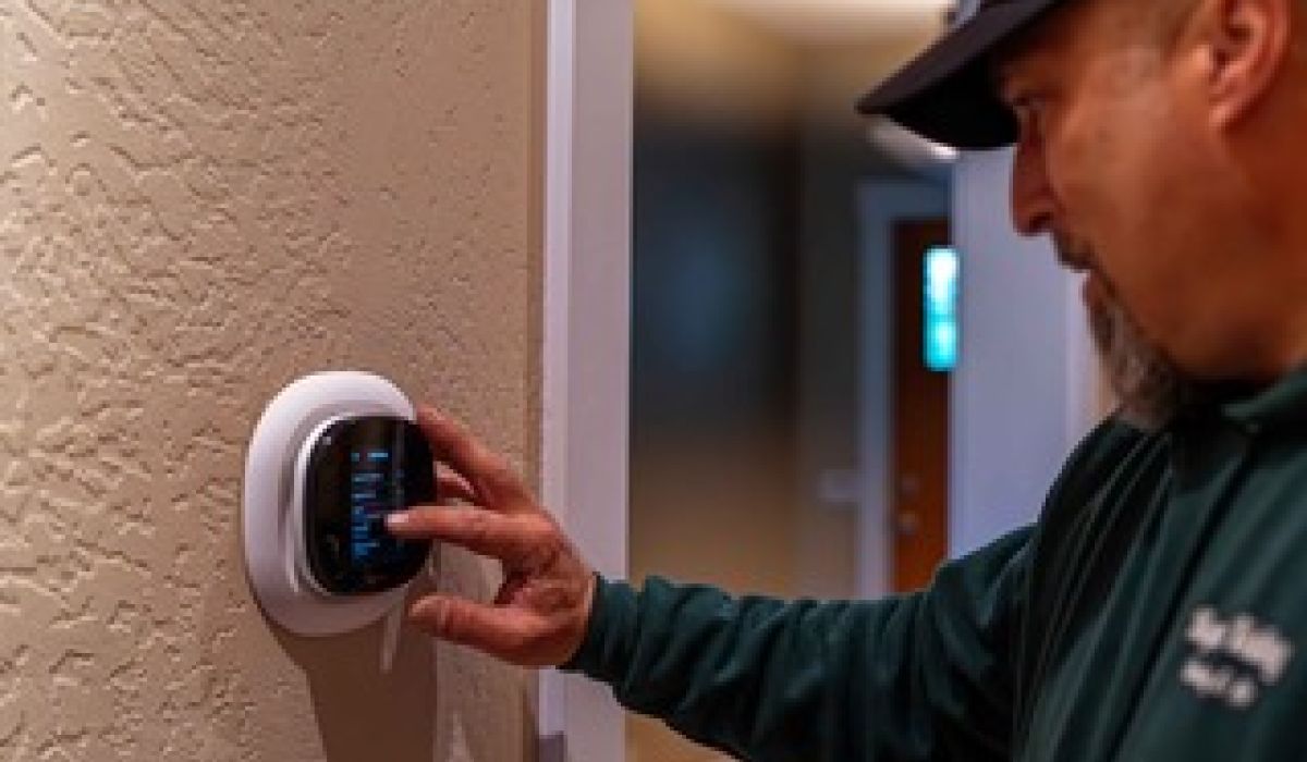 Image of an RV technician repairing a furnace