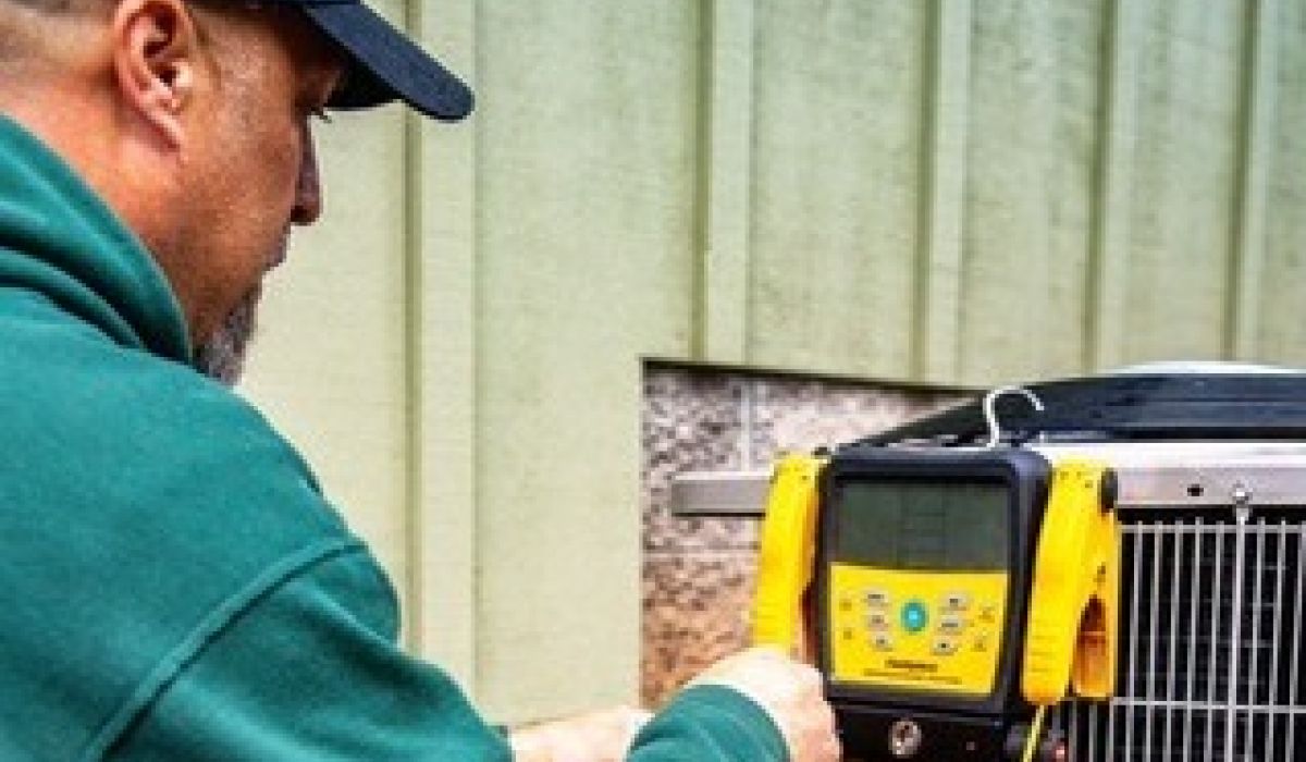 Image of a wrench tightening a leaking faucet