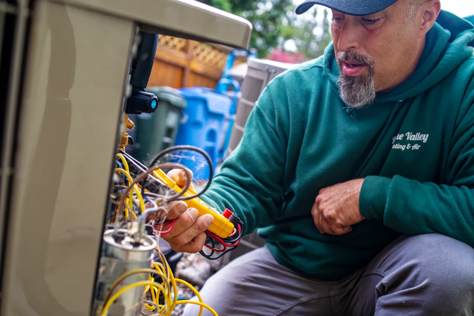 Electrician installing a meter base in Grants Pass, Oregon.